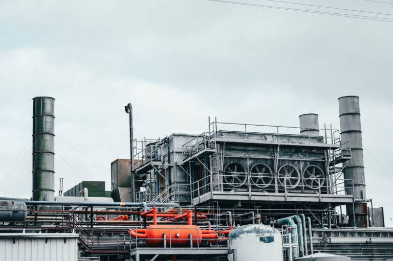 Factory with Tall Metal Pipes
