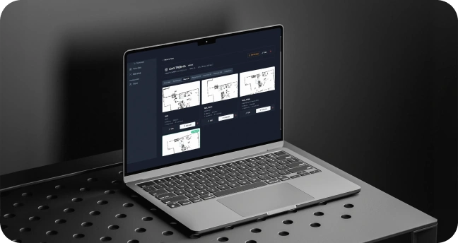laptop screen showing wireframes